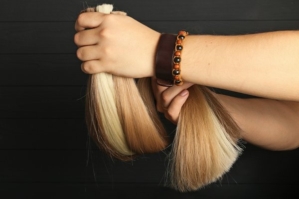 Optimisez l'entretien de vos rajouts avec la brosse extension cheveux